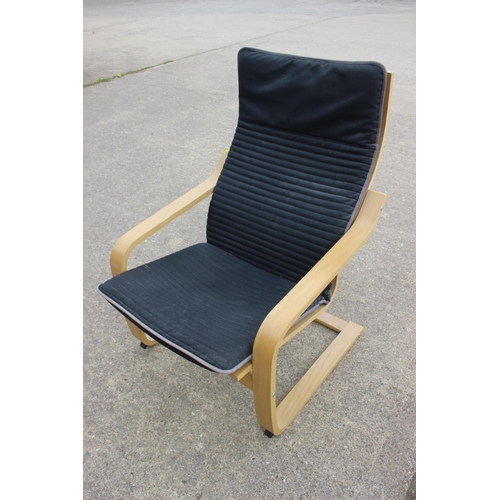 533 - A pair of bentwood open armchairs with black seat cushions