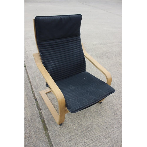 533 - A pair of bentwood open armchairs with black seat cushions