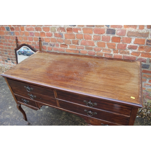 549 - A mahogany dressing table, fitted mirror over two short, one long and two small drawers, with copper... 