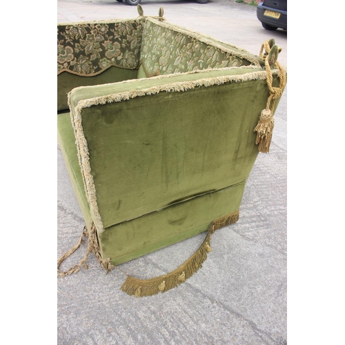 550 - A Knole settee, upholstered in a green velvet with brocaded panels, 66