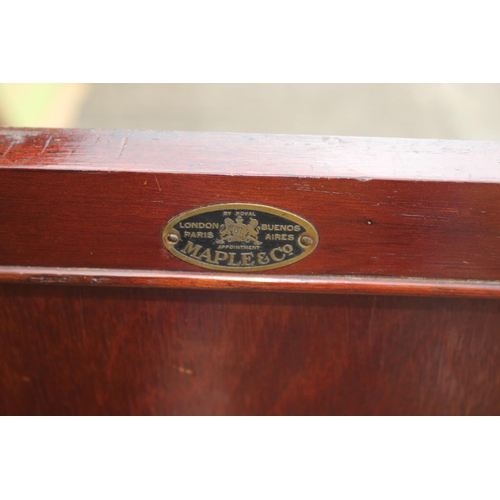 552 - A Maples Edwardian mahogany and box inlaid ledge back bedside cupboard enclosed one door, on square ... 