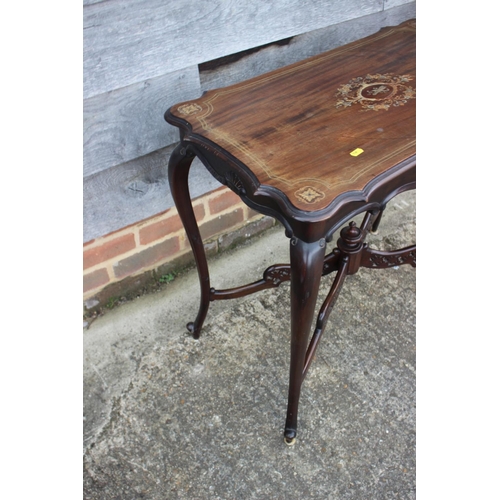 553 - An early 20th century mahogany and inlaid serpentine top occasional table, on cabriole supports unit... 