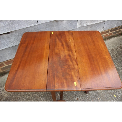 575 - A figured mahogany Sutherland drop leaf table, on square supports and claw and ball feet, 25 1/2