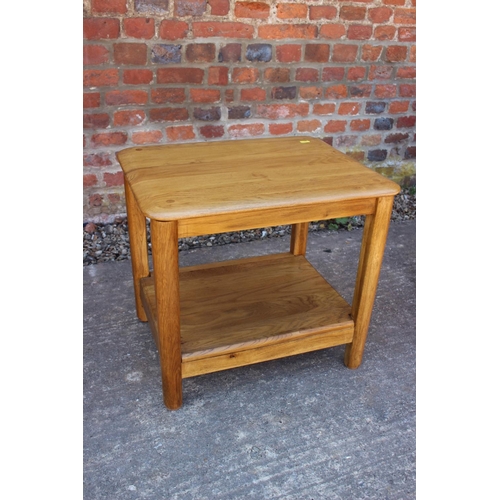 585 - A light oak bedside cupboard, fitted two drawers, 20