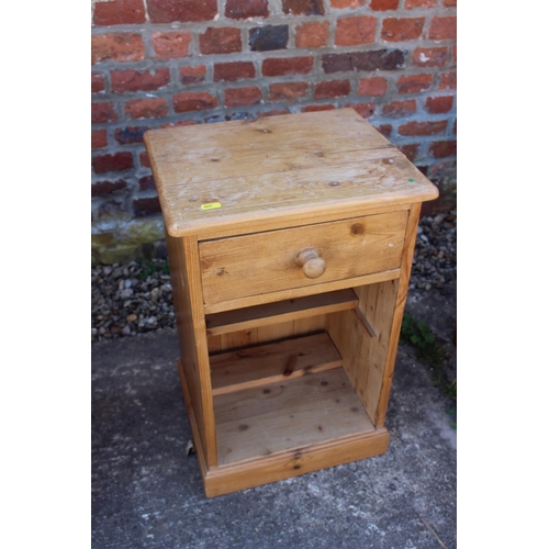 598 - A stripped pine bedside cupboard, fitted one drawer over open shelf, 14