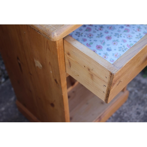 598 - A stripped pine bedside cupboard, fitted one drawer over open shelf, 14