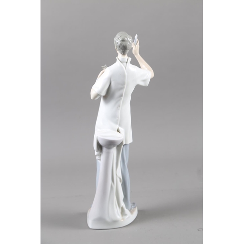 6 - A Lladro figure, 