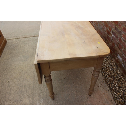 604 - A late 19th century sycamore single drop leaf table, fitted two drawers with turned hardwood knobs, ... 