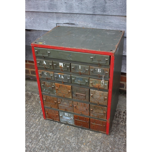 615 - A green painted art metal tool chest of twenty-one drawers, in sizes, 22