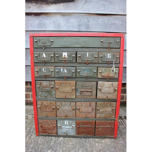 615 - A green painted art metal tool chest of twenty-one drawers, in sizes, 22