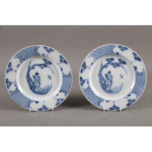 71 - An 18th century Delft blue and white bowl with floral decoration, 12 1/4