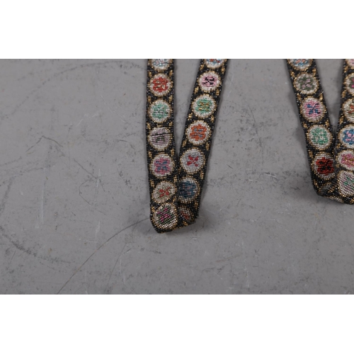 203 - A 19th century beadwork belt, 38