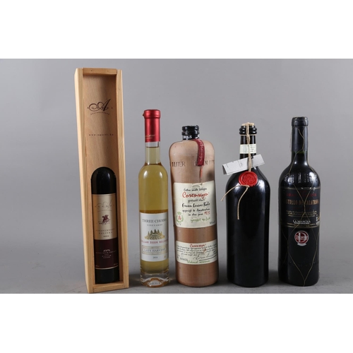 225 - A stoneware 1L bottle of Bols, a 37.5cl bottle of Three Choirs Late Harvest 2014, a 37.5cl bottle, A... 