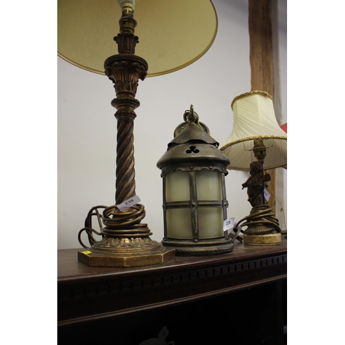 239 - A carved giltwood table lamp with barley twist column, on octagonal base, 18 3/4