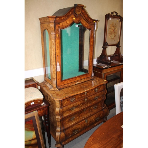 437 - A late 19th century Dutch figured walnut marquetry bombe display cabinet, the upper section enclosed... 