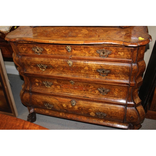 437 - A late 19th century Dutch figured walnut marquetry bombe display cabinet, the upper section enclosed... 