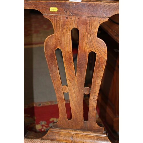 440 - A late 18th century oak and chestnut elbow chair with panel seat and pierced splat back, on chamfere... 