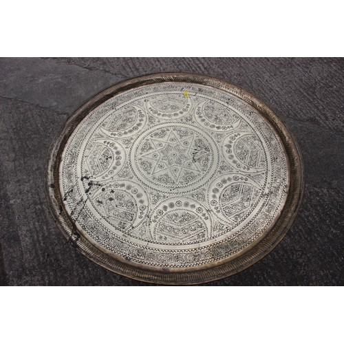 513 - An Indian circular brass tray, 28