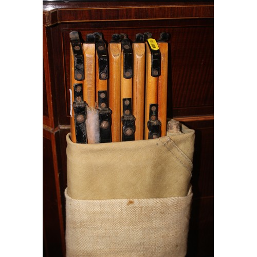 132 - A WWII camp bed, in canvas bag