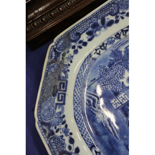 119 - A Chinese blue and white bamboo peony and rock decorated plate, 11