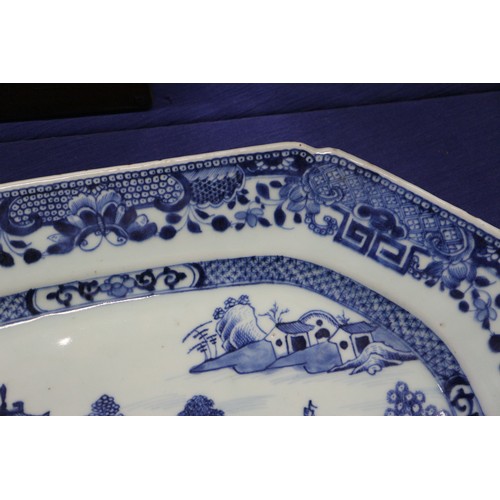 119 - A Chinese blue and white bamboo peony and rock decorated plate, 11