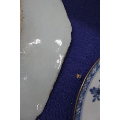 119 - A Chinese blue and white bamboo peony and rock decorated plate, 11