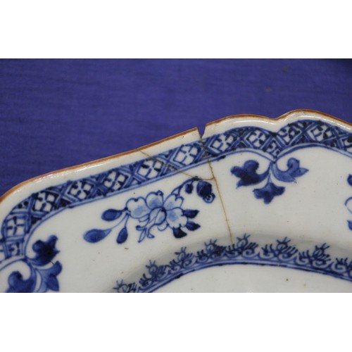 119 - A Chinese blue and white bamboo peony and rock decorated plate, 11