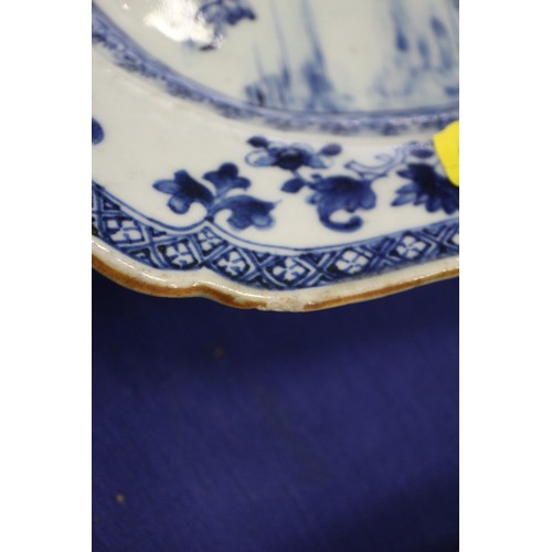 119 - A Chinese blue and white bamboo peony and rock decorated plate, 11