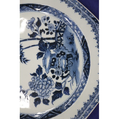 119 - A Chinese blue and white bamboo peony and rock decorated plate, 11