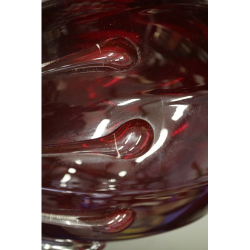 234 - A cranberry coloured glass bulbous table lamp, 13