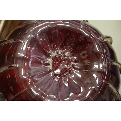 234 - A cranberry coloured glass bulbous table lamp, 13