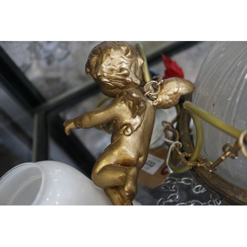 233 - A two-branch ceiling light, formed as two gilt cherubs, with milk glass shades and another ceiling p... 