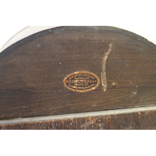 137 - An oak cased arch top mantel clock with barley twist columns, silvered dial and Arabic numerals, 12 ... 