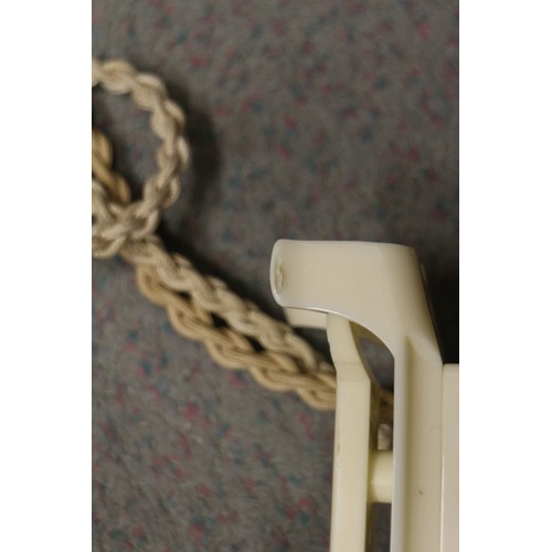 125 - A 200 series cream Bakelite telephone with wall 