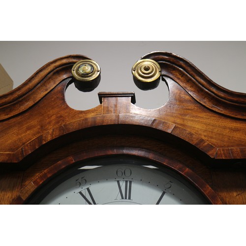 518 - An early 19th century oak and mahogany banded provincial long case clock with painted circular dial ... 