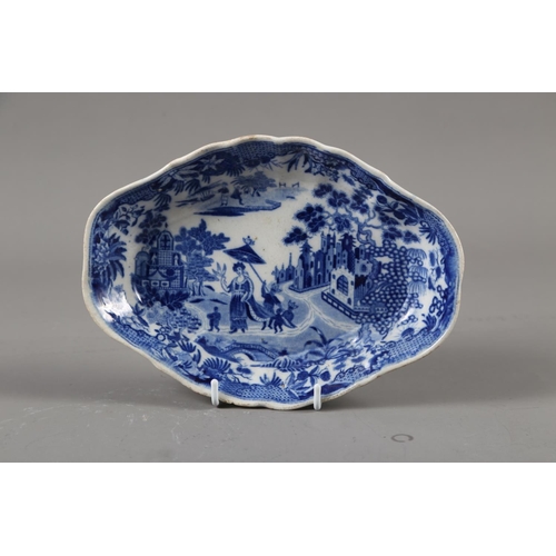 6 - A 19th century blue and white pearlware shaped dish with chinoiserie decoration, 8