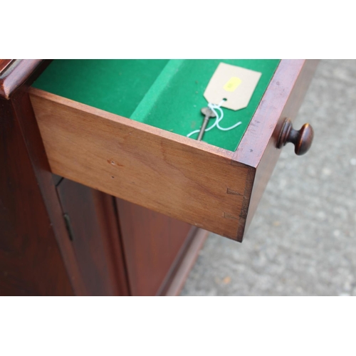 567 - A 19th century ledge back sideboard, fitted two drawers over cupboard enclosed two panel doors, on b... 