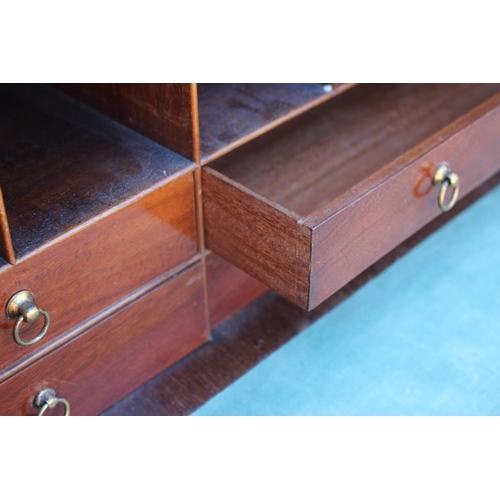 573 - A late Georgian mahogany secretaire bookcase, the upper section enclosed lattice glazed door over fi... 