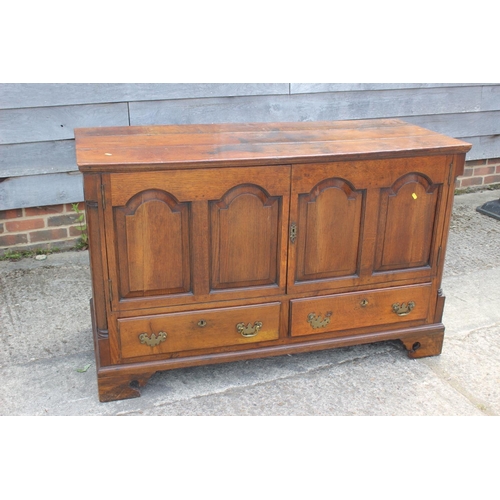 543 - An 18th century oak mule chest, now converted as a cupboard, fitted two drawers, on bracket feet, 55... 