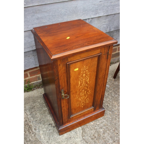 545 - A 19th century rosewood and inlaid bedside cupboard enclosed panel door, on block base, 16 1/2