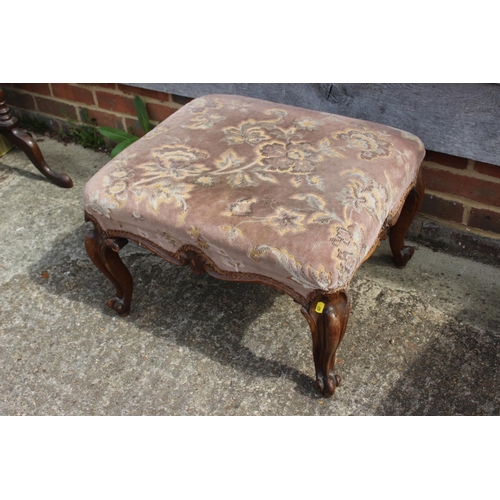 579 - A 19th century carved rosewood stool, upholstered in a floral cut velvet, on cabriole supports, 24