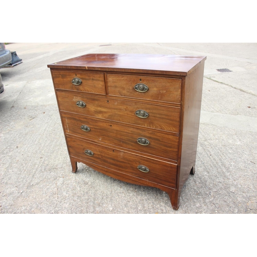 585 - A 19th century mahogany chest of two short and three long graduated drawers with stamped brass lion ... 