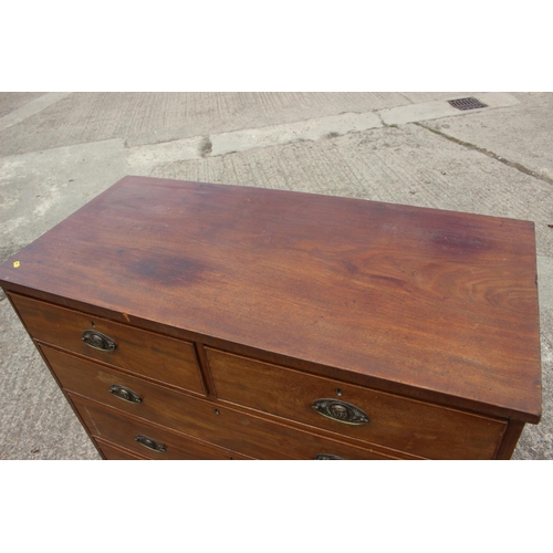 585 - A 19th century mahogany chest of two short and three long graduated drawers with stamped brass lion ... 