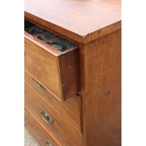 585 - A 19th century mahogany chest of two short and three long graduated drawers with stamped brass lion ... 