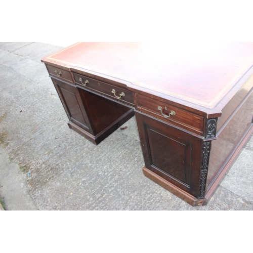 596 - A partners early 20th century mahogany double pedestal desk with tooled lined leather top, inverse b... 