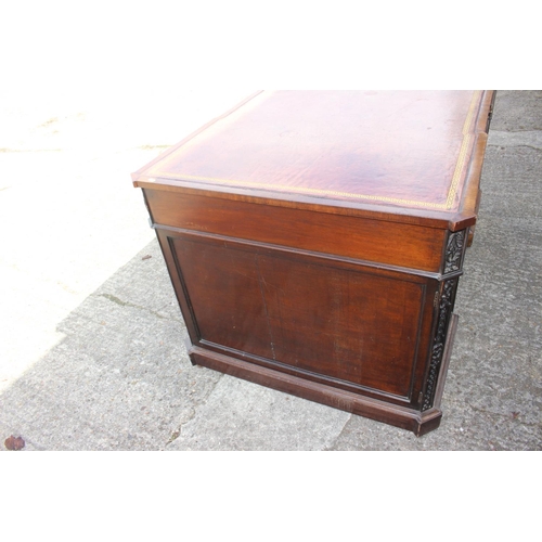 596 - A partners early 20th century mahogany double pedestal desk with tooled lined leather top, inverse b... 