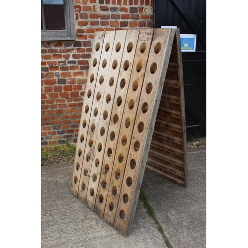 731 - A French oak planked riddling rack champagne bottle holder, 30 1/4