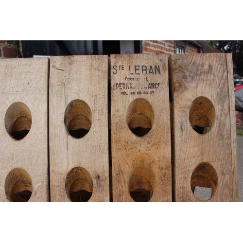 731 - A French oak planked riddling rack champagne bottle holder, 30 1/4