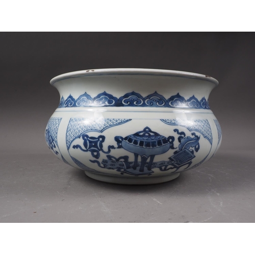 109 - A Chinese blue and white jardiniere with panelled precious object decoration, 8 3/4