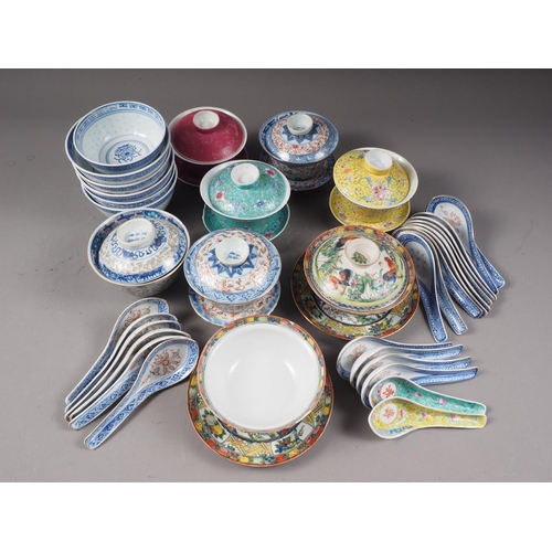 123 - Seven Chinese polychrome decorated rice bowls and covers, rice spoons and other items